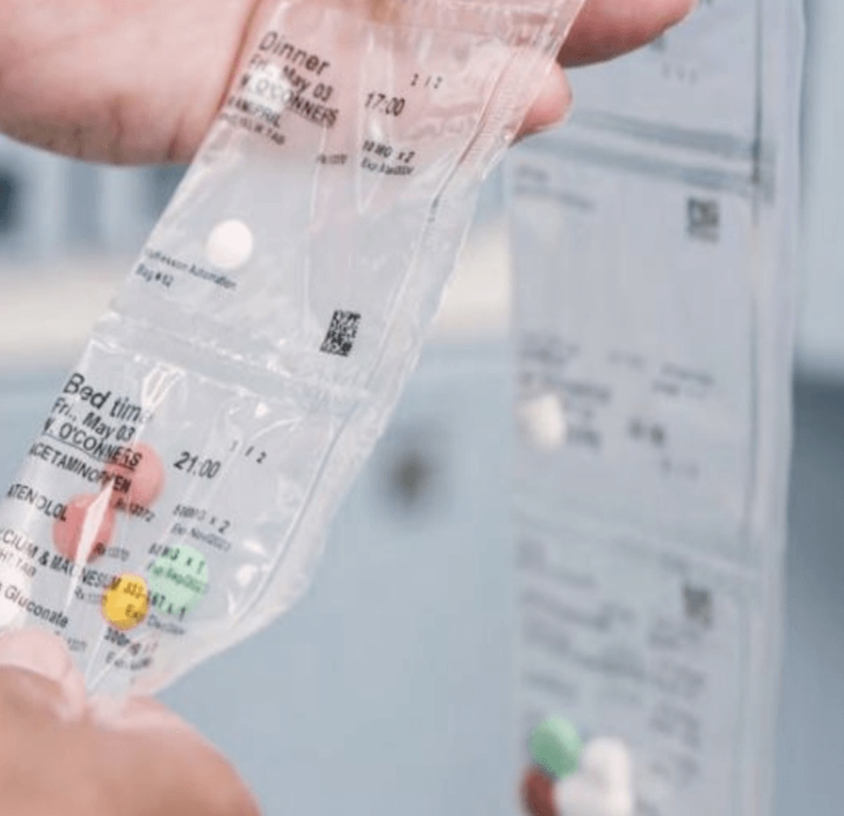 Close-up of medication pouch strip with daily doses